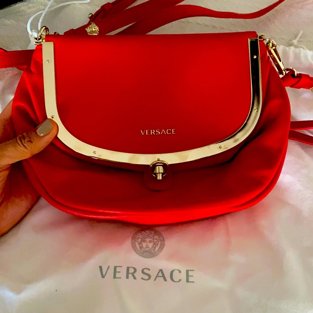 Versace stunning clutch/ crossover